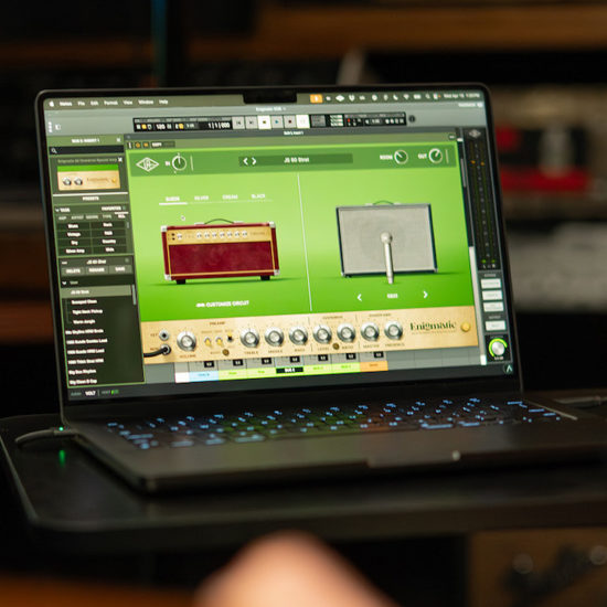 Universal Audio UAD Enigmatic '82 Overdrive Special amp simulator plugin interface in a DAW, featuring D-style boutique guitar amp modeling, Rock Jazz Custom voicings, and cabinet and microphone simulations.